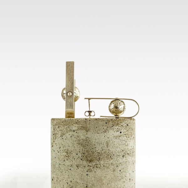 Memento Collection - Revolve earrings, silver