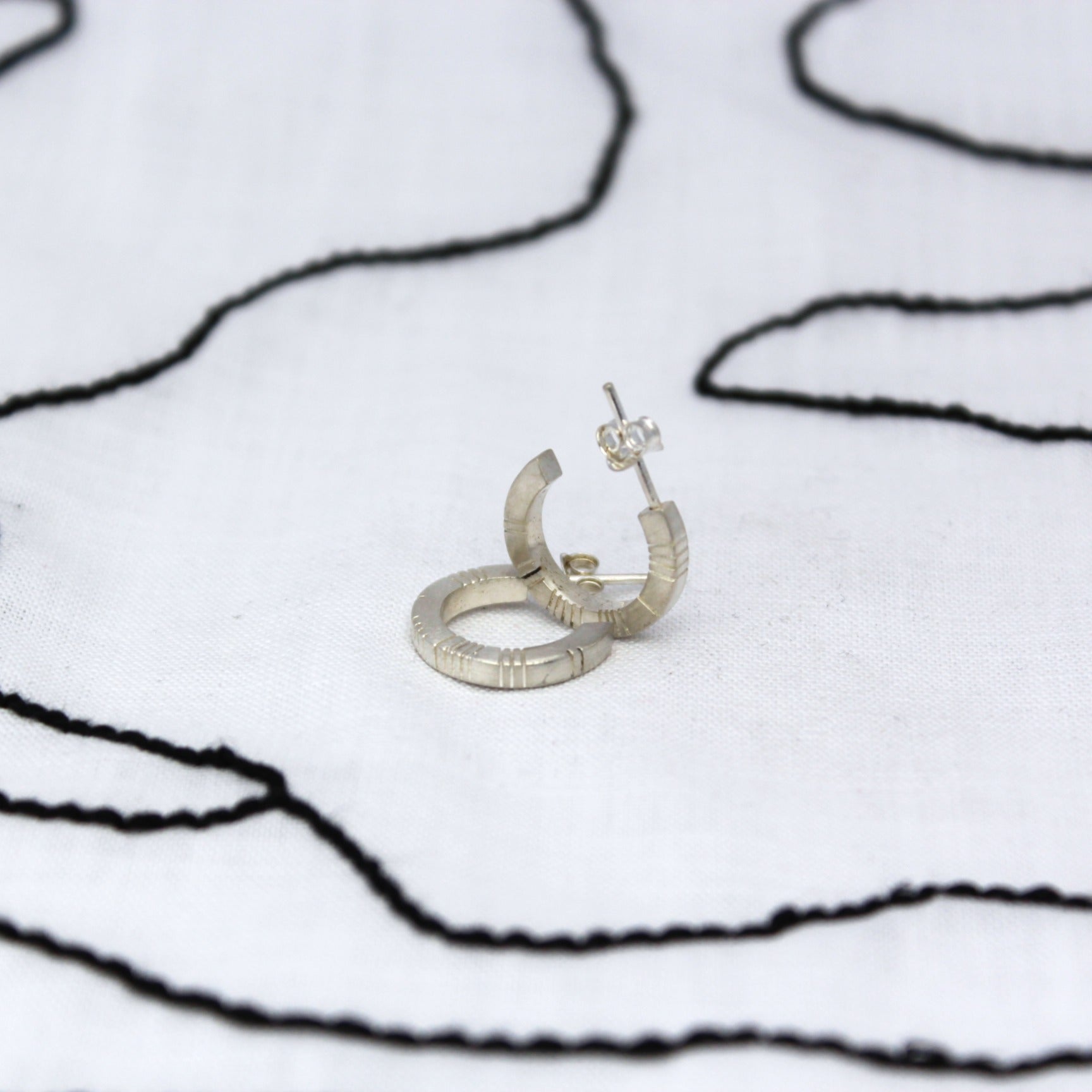 Ogham earrings - brushed silver